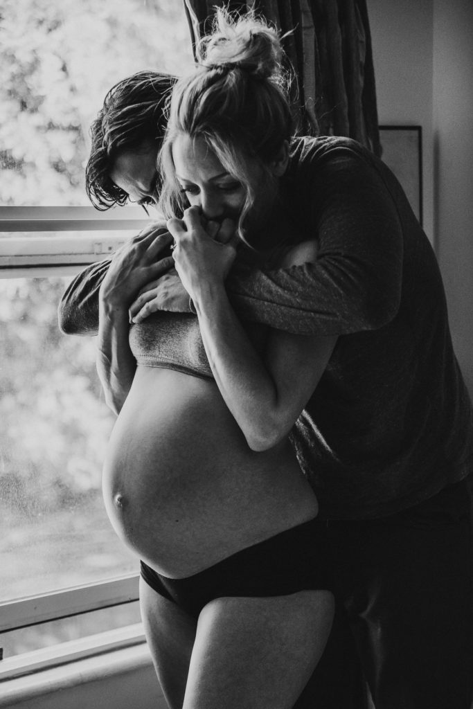 Couple embracing; Maternity photography Los Angeles, CA