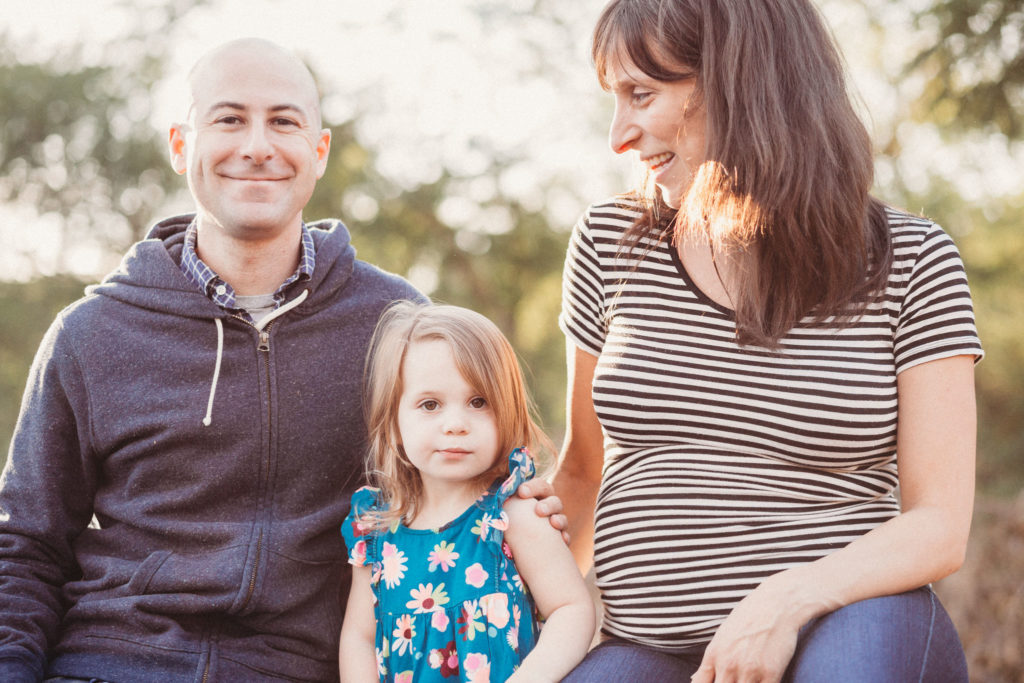 Mom, dad, and daughter - a family portrait